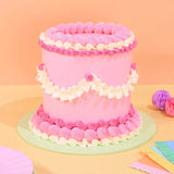 Vintage Cake - Tonal Colour with pink and white Swiss Meringue buttercream decoration on six-layer sponge by Crumbs & Doilies.